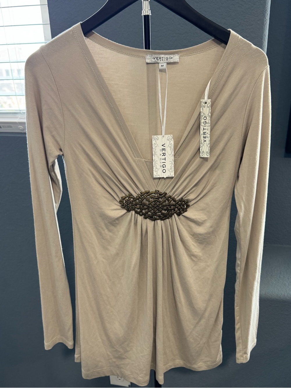 Vertigo Paris Taupe Long Sleeve V-Neck Top with Braided Medallion